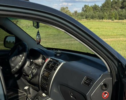 Зеленый Хендай Туксон, объемом двигателя 1.98 л и пробегом 180 тыс. км за 9999 $, фото 6 на Automoto.ua