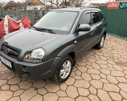 Зеленый Хендай Туксон, объемом двигателя 2 л и пробегом 65 тыс. км за 12250 $, фото 14 на Automoto.ua