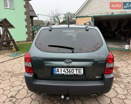 Зелений Хендай Туксон, об'ємом двигуна 2 л та пробігом 65 тис. км за 12250 $, фото 5 на Automoto.ua