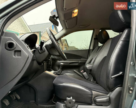 Зелений Хендай Туксон, об'ємом двигуна 2 л та пробігом 65 тис. км за 12250 $, фото 47 на Automoto.ua