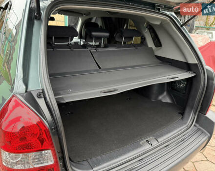 Зелений Хендай Туксон, об'ємом двигуна 2 л та пробігом 65 тис. км за 12250 $, фото 43 на Automoto.ua