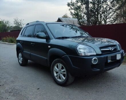 Зеленый Хендай Туксон, объемом двигателя 2 л и пробегом 97 тыс. км за 9600 $, фото 1 на Automoto.ua