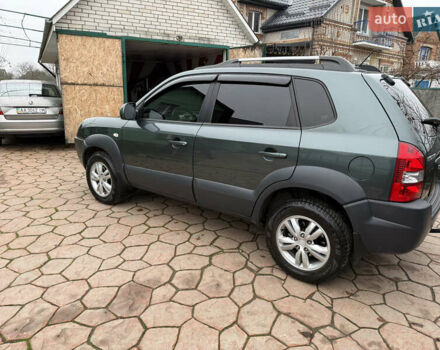Зеленый Хендай Туксон, объемом двигателя 2 л и пробегом 65 тыс. км за 12250 $, фото 18 на Automoto.ua
