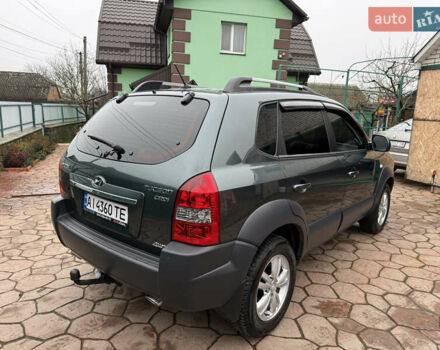 Зелений Хендай Туксон, об'ємом двигуна 2 л та пробігом 65 тис. км за 12250 $, фото 8 на Automoto.ua