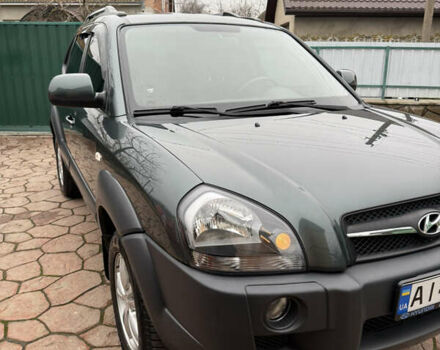 Зелений Хендай Туксон, об'ємом двигуна 2 л та пробігом 65 тис. км за 12250 $, фото 26 на Automoto.ua