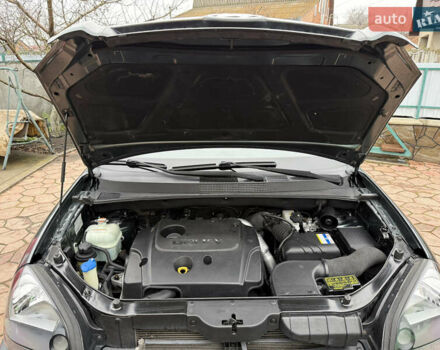 Зеленый Хендай Туксон, объемом двигателя 2 л и пробегом 65 тыс. км за 12250 $, фото 34 на Automoto.ua