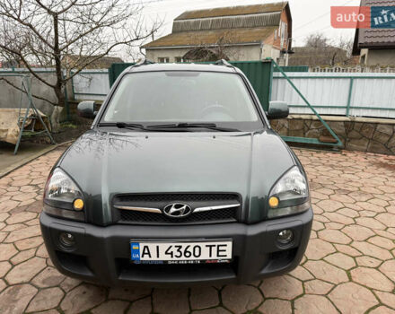 Зеленый Хендай Туксон, объемом двигателя 2 л и пробегом 65 тыс. км за 12250 $, фото 11 на Automoto.ua