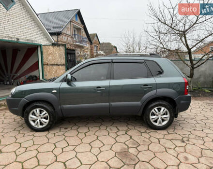 Зелений Хендай Туксон, об'ємом двигуна 2 л та пробігом 65 тис. км за 12250 $, фото 15 на Automoto.ua