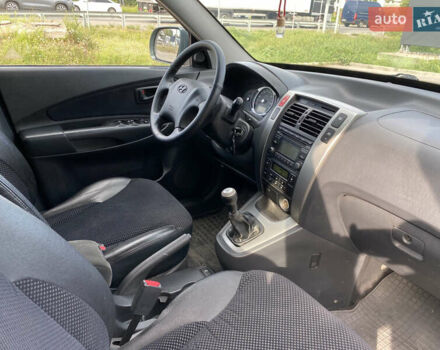 Зеленый Хендай Туксон, объемом двигателя 1.98 л и пробегом 235 тыс. км за 9200 $, фото 16 на Automoto.ua
