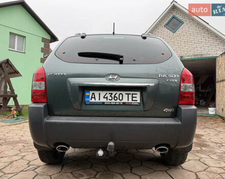 Зеленый Хендай Туксон, объемом двигателя 2 л и пробегом 65 тыс. км за 12250 $, фото 5 на Automoto.ua