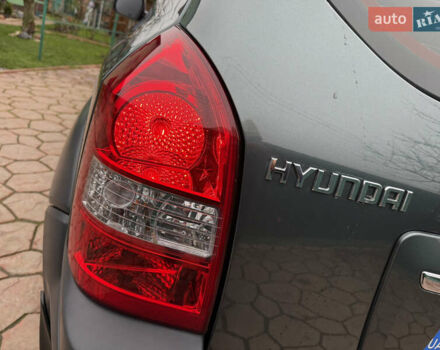 Зеленый Хендай Туксон, объемом двигателя 2 л и пробегом 65 тыс. км за 12250 $, фото 22 на Automoto.ua