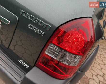 Зелений Хендай Туксон, об'ємом двигуна 2 л та пробігом 65 тис. км за 12250 $, фото 23 на Automoto.ua