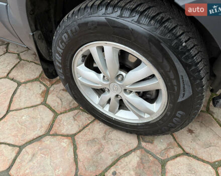 Зеленый Хендай Туксон, объемом двигателя 2 л и пробегом 65 тыс. км за 12250 $, фото 33 на Automoto.ua