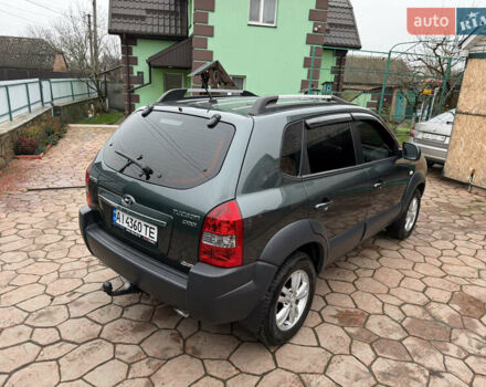 Зелений Хендай Туксон, об'ємом двигуна 2 л та пробігом 65 тис. км за 12250 $, фото 10 на Automoto.ua