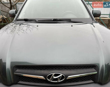 Зеленый Хендай Туксон, объемом двигателя 2 л и пробегом 65 тыс. км за 12250 $, фото 31 на Automoto.ua