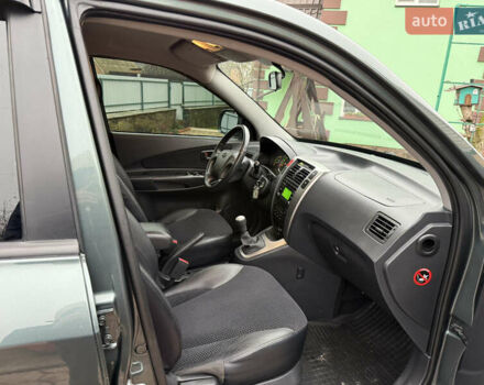 Зеленый Хендай Туксон, объемом двигателя 2 л и пробегом 65 тыс. км за 12250 $, фото 76 на Automoto.ua