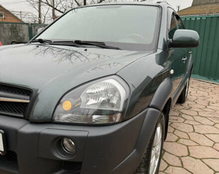 Зелений Хендай Туксон, об'ємом двигуна 2 л та пробігом 65 тис. км за 12250 $, фото 25 на Automoto.ua