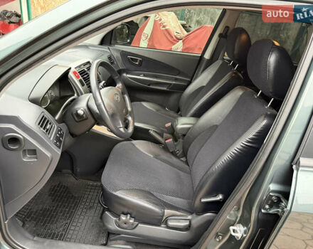 Зеленый Хендай Туксон, объемом двигателя 2 л и пробегом 65 тыс. км за 12250 $, фото 48 на Automoto.ua