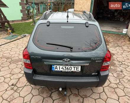 Зелений Хендай Туксон, об'ємом двигуна 2 л та пробігом 65 тис. км за 12250 $, фото 6 на Automoto.ua