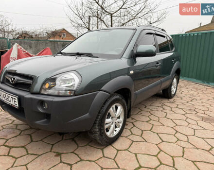 Зелений Хендай Туксон, об'ємом двигуна 2 л та пробігом 65 тис. км за 12250 $, фото 14 на Automoto.ua