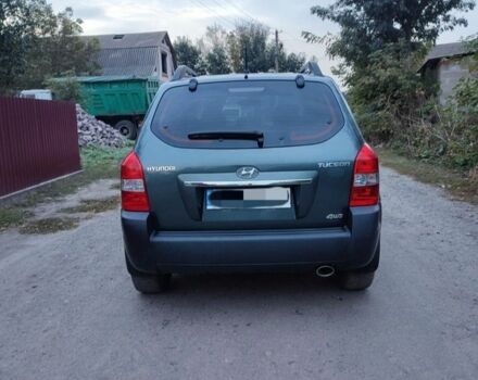 Зеленый Хендай Туксон, объемом двигателя 2 л и пробегом 97 тыс. км за 9600 $, фото 3 на Automoto.ua