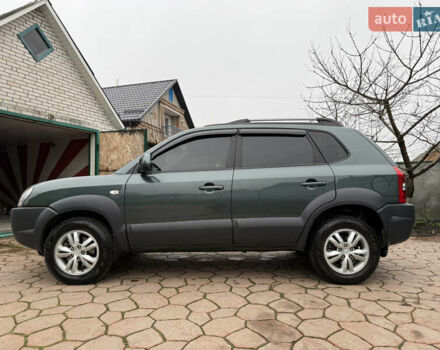 Зелений Хендай Туксон, об'ємом двигуна 2 л та пробігом 65 тис. км за 12250 $, фото 16 на Automoto.ua