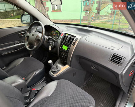 Зелений Хендай Туксон, об'ємом двигуна 2 л та пробігом 65 тис. км за 12250 $, фото 75 на Automoto.ua