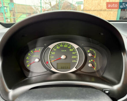 Зелений Хендай Туксон, об'ємом двигуна 2 л та пробігом 65 тис. км за 12250 $, фото 54 на Automoto.ua