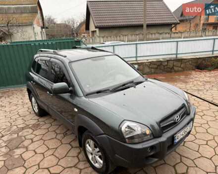 Зеленый Хендай Туксон, объемом двигателя 2 л и пробегом 65 тыс. км за 12250 $, фото 9 на Automoto.ua