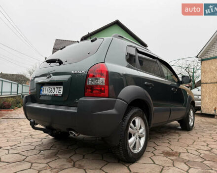 Зелений Хендай Туксон, об'ємом двигуна 2 л та пробігом 65 тис. км за 12250 $, фото 9 на Automoto.ua
