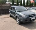 Зеленый Хендай Туксон, объемом двигателя 1.98 л и пробегом 410 тыс. км за 8000 $, фото 1 на Automoto.ua