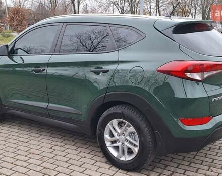 Зелений Хендай Туксон, об'ємом двигуна 2 л та пробігом 218 тис. км за 16999 $, фото 9 на Automoto.ua