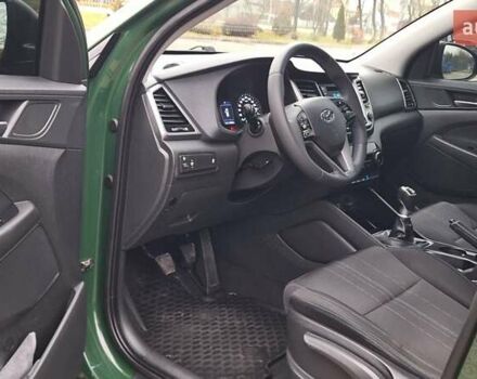 Зелений Хендай Туксон, об'ємом двигуна 2 л та пробігом 218 тис. км за 16999 $, фото 18 на Automoto.ua