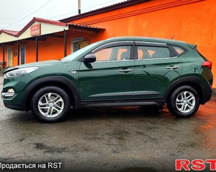 Зеленый Хендай Туксон, объемом двигателя 2 л и пробегом 213 тыс. км за 17900 $, фото 2 на Automoto.ua