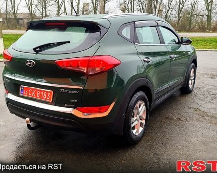 Зеленый Хендай Туксон, объемом двигателя 2 л и пробегом 213 тыс. км за 17900 $, фото 5 на Automoto.ua