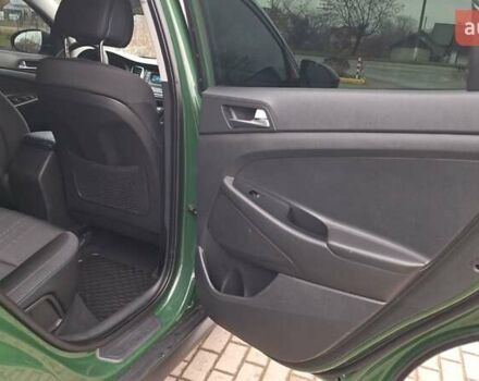 Зелений Хендай Туксон, об'ємом двигуна 2 л та пробігом 218 тис. км за 16999 $, фото 17 на Automoto.ua