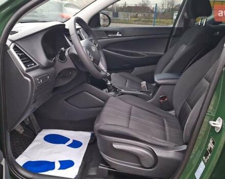 Зелений Хендай Туксон, об'ємом двигуна 2 л та пробігом 218 тис. км за 16999 $, фото 34 на Automoto.ua