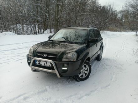 Зеленый Хендай Туксон, объемом двигателя 2 л и пробегом 309 тыс. км за 3728 $, фото 1 на Automoto.ua