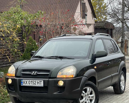 Зелений Хендай Туксон, об'ємом двигуна 1.98 л та пробігом 261 тис. км за 7499 $, фото 1 на Automoto.ua