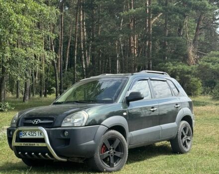 Зелений Хендай Туксон, об'ємом двигуна 2 л та пробігом 380 тис. км за 7350 $, фото 1 на Automoto.ua