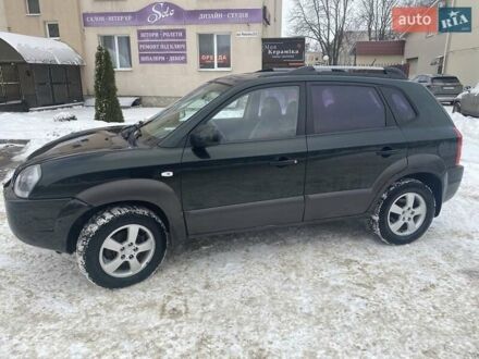 Зеленый Хендай Туксон, объемом двигателя 2 л и пробегом 250 тыс. км за 6500 $, фото 1 на Automoto.ua