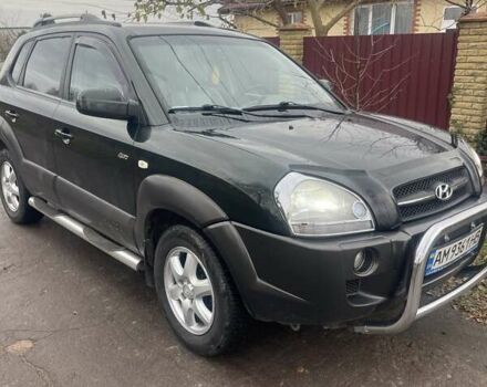 Зеленый Хендай Туксон, объемом двигателя 2 л и пробегом 201 тыс. км за 7600 $, фото 1 на Automoto.ua