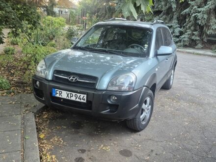 Зеленый Хендай Туксон, объемом двигателя 2 л и пробегом 190 тыс. км за 5000 $, фото 1 на Automoto.ua