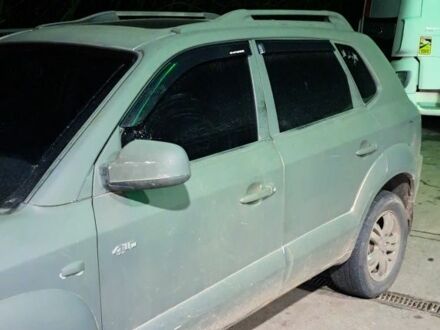 Зеленый Хендай Туксон, объемом двигателя 2 л и пробегом 380 тыс. км за 3500 $, фото 1 на Automoto.ua