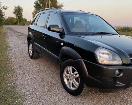 Зелений Хендай Туксон, об'ємом двигуна 2 л та пробігом 260 тис. км за 7500 $, фото 1 на Automoto.ua