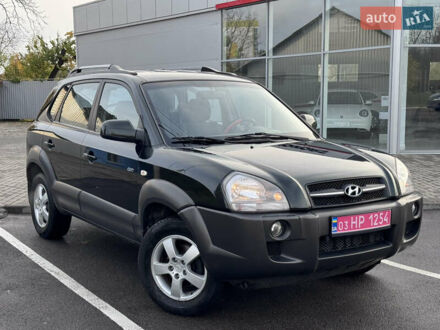 Зеленый Хендай Туксон, объемом двигателя 2 л и пробегом 221 тыс. км за 8299 $, фото 1 на Automoto.ua