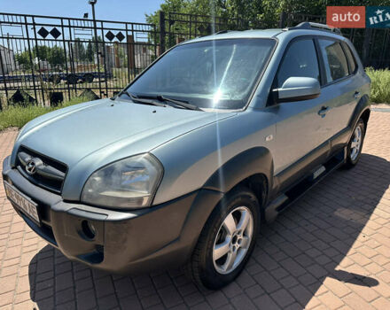 Зеленый Хендай Туксон, объемом двигателя 1.98 л и пробегом 230 тыс. км за 6999 $, фото 1 на Automoto.ua