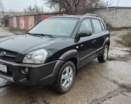Зеленый Хендай Туксон, объемом двигателя 2 л и пробегом 241 тыс. км за 6900 $, фото 1 на Automoto.ua