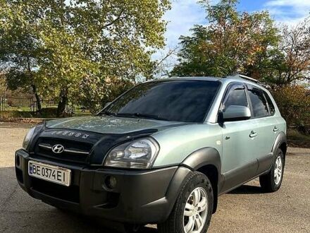 Зеленый Хендай Туксон, объемом двигателя 2 л и пробегом 270 тыс. км за 7500 $, фото 1 на Automoto.ua