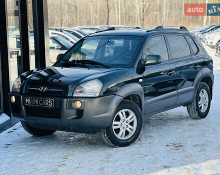 Зеленый Хендай Туксон, объемом двигателя 2 л и пробегом 202 тыс. км за 8299 $, фото 1 на Automoto.ua